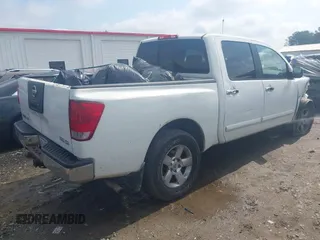 2004 Nissan Titan LE with VIN 1N6AA07B74N581334, listed as a IAAI auction lot 42265633 with 189,892 mi miles and . Bid and sale history available at DreamBid. Image 4.