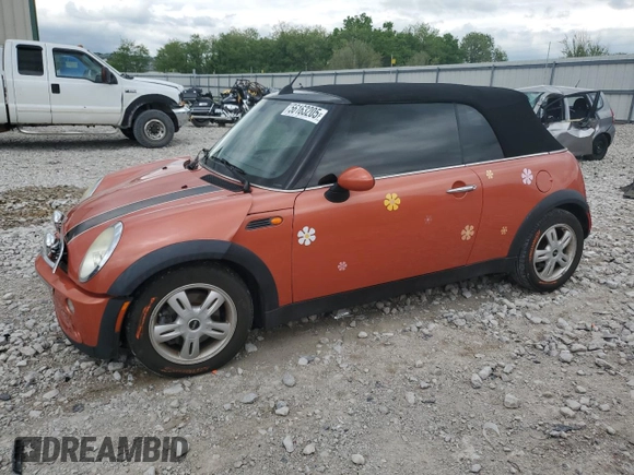 2006 MINI Convertible with VIN WMWRF335X6TG15824, listed as a Copart auction lot 56163205 with 113,109 mi miles and Salvage title. Bid and sale history available at DreamBid. Image 1.