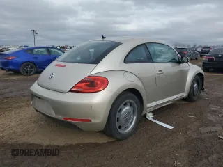 2012 Volkswagen Beetle 2.5L with VIN 3VWJX7ATXCM642807, listed as a Copart auction lot 42936475 with 100,678 mi miles and Salvage Title. Bid and sale history available at carsss.com. Image 3.