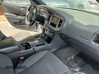 2014 Dodge Charger SE with VIN 2C3CDXBG8EH187998, listed as a IAAI auction lot 42175958 with 135,388 mi miles and . Bid and sale history available at carsss.com. Image 5.