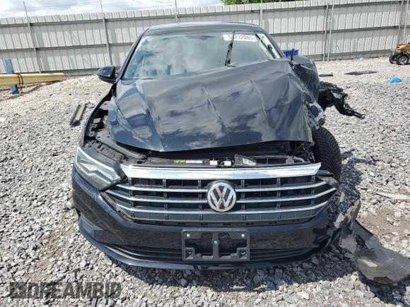 2019 Volkswagen Jetta S z VIN 3VWCB7BUXKM161873, wystawiony jako Copart lot #58712005 z przebiegiem Nie podano mil oraz Szkoda całkowita • Salvage title. Historia ofert i sprzedaży dostępna na DreamBid. Obrazek 5.