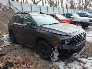 2022 Hyundai Santa Fe XRT with VIN 5NMS6DAJ5NH411892, listed as a IAAI auction lot 41393559 with 28,744 mi miles. Bid and sale history available at carsss.com. Image 1.