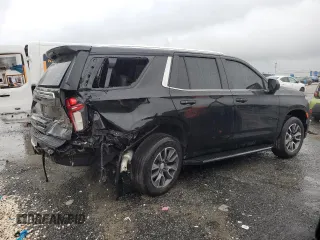 2021 Chevrolet Tahoe LS with VIN 1GNSCMKD4MR335973, listed as a Copart auction lot 69972594 with 42,129 mi miles and Salvage title. Bid and sale history available at DreamBid. Image 3.