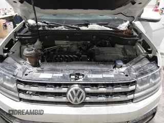 2019 Volkswagen Atlas SE z VIN 1V2XR2CA0KC595596, wystawiony jako IAAI lot #41410019 z przebiegiem 103 336 mil mil oraz . Historia ofert i sprzedaży dostępna na DreamBid. Obrazek 10.