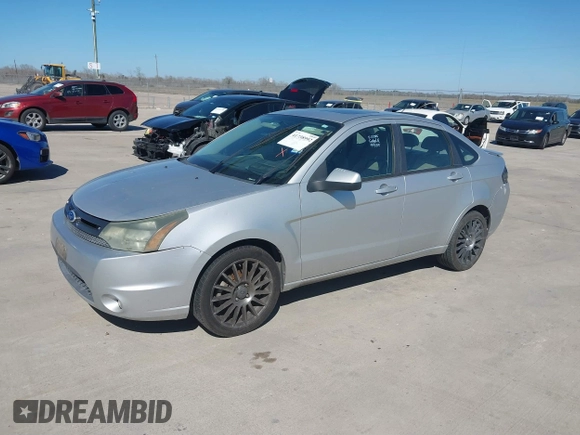2011 Ford Focus SES with VIN 1FAHP3GN4BW136106, listed as a IAAI auction lot 41738992 with 163,167 mi miles. Bid and sale history available at carsss.com. Image 2.