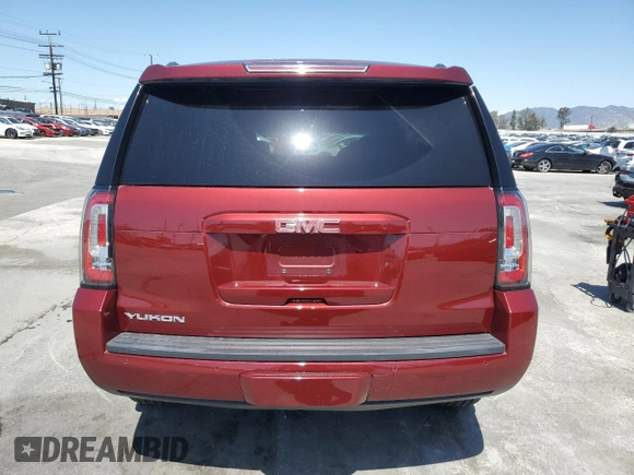 2019 GMC Yukon SLE with VIN 1GKS1AKC9KR355643, listed as a Copart auction lot 52050855 with 50,729 mi miles and Salvage Title. Bid and sale history available at carsss.com. Image 6.