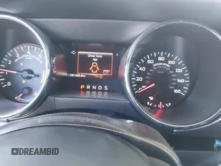 2016 Ford Mustang EcoBoost with VIN 1FA6P8TH8G5242740, listed as a IAAI auction lot 41669556 with 91,426 mi miles. Bid and sale history available at carsss.com. Image 7.