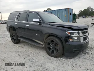 2017 Chevrolet Tahoe LS with VIN 1GNSCAKCXHR345290, listed as a Copart auction lot 53790035 with 134,212 mi miles and Salvage title. Bid and sale history available at DreamBid. Image 4.