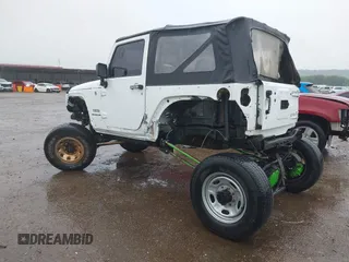 2013 Jeep Wrangler Sport with VIN 1C4AJWAG8DL601399, listed as a IAAI auction lot 42186399 with 130,195 mi miles and . Bid and sale history available at DreamBid. Image 3.