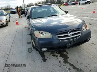 2003 Nissan Maxima SE z VIN JN1DA31A33T434264, wystawiony jako Copart lot #42189665 z przebiegiem 230 582 mil mil oraz Czysty tytuł • Clean title. Historia ofert i sprzedaży dostępna na DreamBid. Obrazek 10.