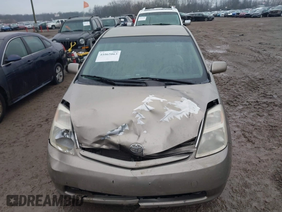 2004 Toyota Prius z VIN JTDKB20U940001168, wystawiony jako IAAI lot #41065063 z przebiegiem 299 999 mil mil oraz . Historia ofert i sprzedaży dostępna na DreamBid. Obrazek 6.