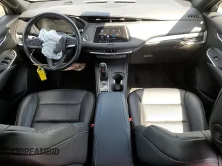 2020 Cadillac XT4 AWD Premium Luxury with VIN 1GYFZDR44LF143798, listed as a Copart auction lot 56134875 with 31,365 mi miles and Salvage title. Bid and sale history available at DreamBid. Image 8.