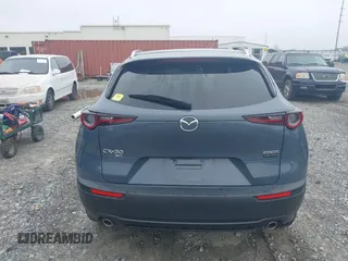 2023 Mazda CX-30 S Carbon Edition with VIN 3MVDMBCM5PM514304, listed as a IAAI auction lot 41795899 with 31,993 mi miles and . Bid and sale history available at DreamBid. Image 16.