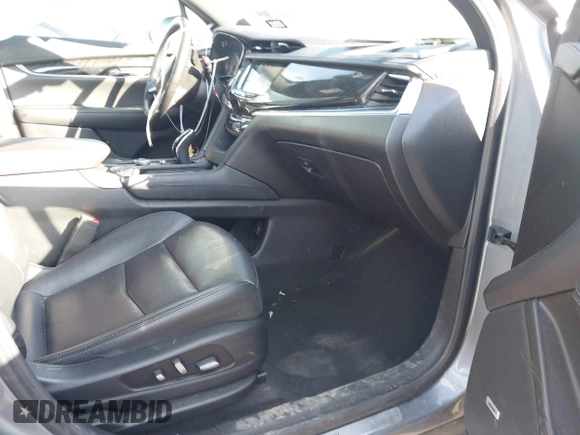 2020 Cadillac XT6 FWD Premium Luxury z VIN 1GYKPCRS8LZ129799, wystawiony jako IAAI lot #41602536 z przebiegiem 96 865 mil mil oraz . Historia ofert i sprzedaży dostępna na DreamBid. Obrazek 5.