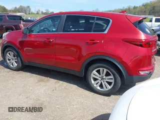 2018 Kia Sportage LX with VIN KNDPM3AC0J7445750, listed as a IAAI auction lot 41936557 with 122,268 mi miles and . Bid and sale history available at DreamBid. Image 3.
