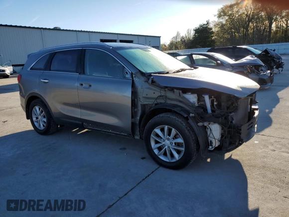 2016 Kia Sorento LX with VIN 5XYPG4A38GG057691, listed as a Copart auction lot 49957855 with 121,047 mi miles and Salvage Title. Bid and sale history available at carsss.com. Image 4.