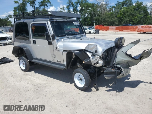 2005 Jeep Wrangler Sport z VIN 1J4FA49S75P324462, wystawiony jako Copart lot #59818995 z przebiegiem 183 558 mil mil oraz Nie do naprawy • Non repairable. Historia ofert i sprzedaży dostępna na DreamBid. Obrazek 4.