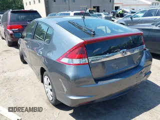 2013 Honda Insight with VIN JHMZE2H31DS002352, listed as a IAAI auction lot 42551515 with 148,393 mi miles and . Bid and sale history available at DreamBid. Image 3.