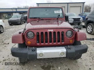 2008 Jeep Wrangler Sahara z VIN 1J4FA54128L561392, wystawiony jako Copart lot #50216865 z przebiegiem 183 825 mil mil oraz Czysty tytuł • Clean title. Historia ofert i sprzedaży dostępna na DreamBid. Obrazek 5.