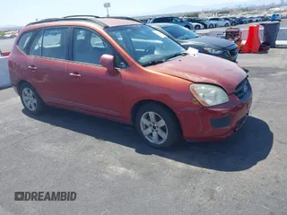 2008 Kia Rondo EX with VIN KNAFG525387174835, listed as a IAAI auction lot 42011406 with 138,656 mi miles. Bid and sale history available at carsss.com. Image 1.