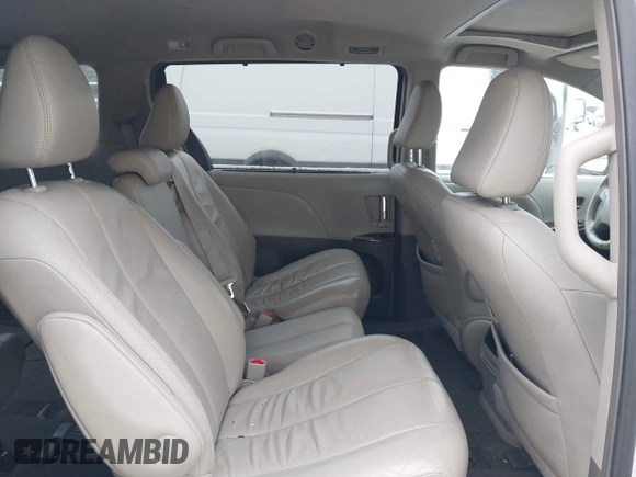 2014 Toyota Sienna XLE z VIN 5TDYK3DC6ES492167, wystawiony jako IAAI lot #41257193 z przebiegiem 216 046 mil mil oraz . Historia ofert i sprzedaży dostępna na DreamBid. Obrazek 8.