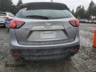 2016 Mazda CX-5 Sport z VIN JM3KE4BY5G0726376, wystawiony jako Copart lot #52009995 z przebiegiem 113 533 mil mil oraz Szkoda całkowita • Salvage title. Historia ofert i sprzedaży dostępna na DreamBid. Obrazek 6.