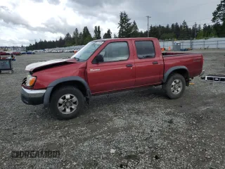 2000 Nissan Frontier XE z VIN 1N6ED27Y0YC321030, wystawiony jako Copart lot #57139295 z przebiegiem 163 929 mil mil oraz Szkoda całkowita • Salvage title. Historia ofert i sprzedaży dostępna na DreamBid. Obrazek 1.