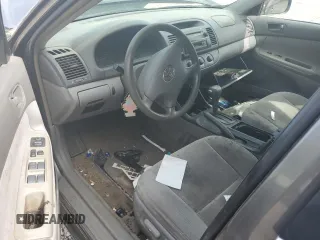 2004 Toyota Camry LE z VIN 4T1BE32K74U848946, wystawiony jako Copart lot #56030995 z przebiegiem Nie podano mil oraz Szkoda całkowita • Salvage title. Historia ofert i sprzedaży dostępna na DreamBid. Obrazek 8.