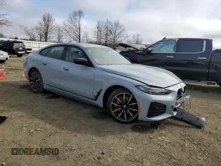2023 BMW i4 eDrive40 z VIN WBY73AW04PFN71418, wystawiony jako Copart lot #49270665 z przebiegiem Nie podano mil oraz Szkoda całkowita • Salvage title. Historia ofert i sprzedaży dostępna na DreamBid. Obrazek 4.