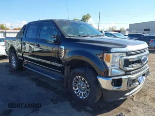 2021 Ford Super Duty F-250 SRW XL with VIN 1FT7W2BT4MEC88324, listed as a IAAI auction lot 40584769 with 163,379 mi miles. Bid and sale history available at carsss.com. Image 1.