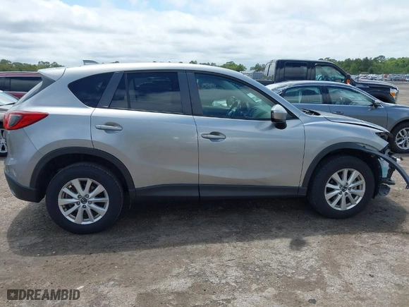 2014 Mazda CX-5 Touring with VIN JM3KE2CY4E0357445, listed as a IAAI auction lot 41967334 with 115,535 mi miles. Bid and sale history available at carsss.com. Image 14.