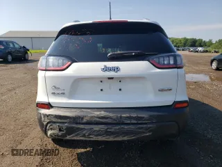 2020 Jeep Cherokee Latitude Plus with VIN 1C4PJMLB2LD638876, listed as a Copart auction lot 61852975 with 103,208 mi miles and Salvage title. Bid and sale history available at DreamBid. Image 6.