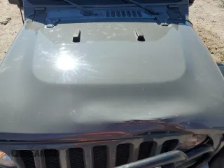 2018 Jeep Wrangler Unlimited Sport S with VIN 1C4HJXDG8JW227693, listed as a Copart auction lot 56694565 with 134,638 mi miles and Salvage title. Bid and sale history available at DreamBid. Image 12.