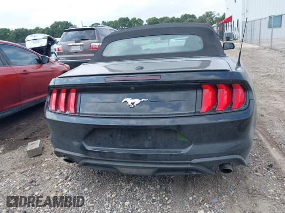 2021 Ford Mustang EcoBoost z VIN 1FATP8UH2M5120226, wystawiony jako IAAI lot #42164009 z przebiegiem 85 571 mil mil oraz . Historia ofert i sprzedaży dostępna na DreamBid. Obrazek 17.