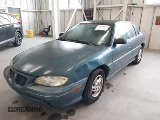 1998 Pontiac Grand Am SE with VIN 1G2NE52T1WC768383, listed as a IAAI auction lot 42220195 with 275,908 mi miles and . Bid and sale history available at DreamBid. Image 2.