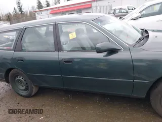 1996 Toyota Camry LE z VIN 4T1EF12K9TU116427, wystawiony jako IAAI lot #38696498 z przebiegiem 242 599 mil mil oraz . Historia ofert i sprzedaży dostępna na DreamBid. Obrazek 12.