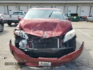 2012 Toyota Sienna XLE AAS with VIN 5TDYK3DC1CS233762, listed as a Copart auction lot 59224495 with 116,155 mi miles and Salvage title. Bid and sale history available at DreamBid. Image 5.
