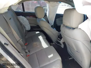 2016 Cadillac CTS Sedan RWD with VIN 1G6AP5SX5G0194397, listed as a IAAI auction lot 41791898 with 77,809 mi miles. Bid and sale history available at carsss.com. Image 8.