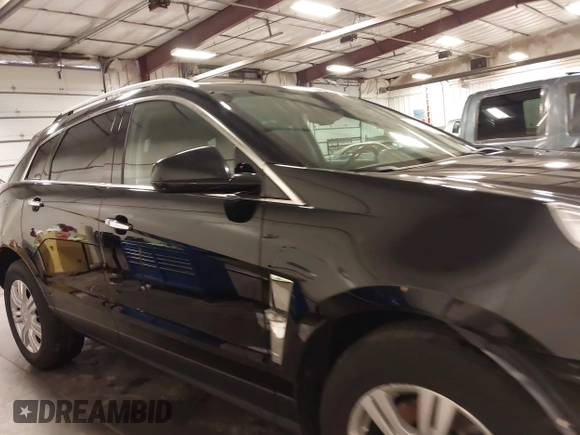 2011 Cadillac SRX Luxury Collection with VIN 3GYFNDEY3BS675672, listed as a IAAI auction lot 41804978 with 148,136 mi miles. Bid and sale history available at carsss.com. Image 13.