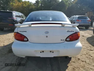 2000 Hyundai Elantra GLS z VIN KMHJF35F8YU922503, wystawiony jako Copart lot #71063234 z przebiegiem 209 706 mil mil oraz Czysty tytuł • Clean title. Historia ofert i sprzedaży dostępna na DreamBid. Obrazek 6.