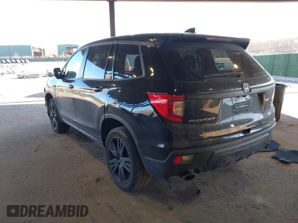 2021 Honda Passport Sport with VIN 5FNYF8H27MB021098, listed as a IAAI auction lot 41333241 with 101,239 mi miles and . Bid and sale history available at DreamBid. Image 3.
