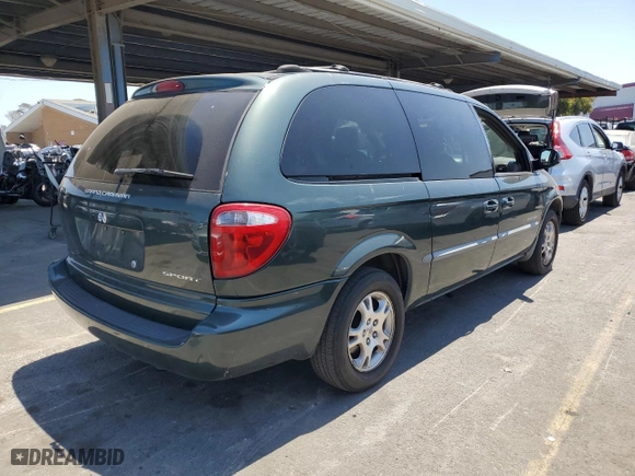 2001 Dodge Caravan Sport with VIN 2B8GP44G31R148820, listed as a Copart auction lot 64069494 with 70,125 mi miles and Salvage Title. Bid and sale history available at carsss.com. Image 3.