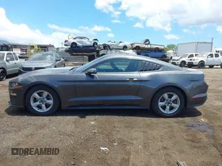 2018 Ford Mustang EcoBoost with VIN 1FA6P8TH0J5123717, listed as a IAAI auction lot 42542683 with 101,729 mi miles and . Bid and sale history available at DreamBid. Image 14.