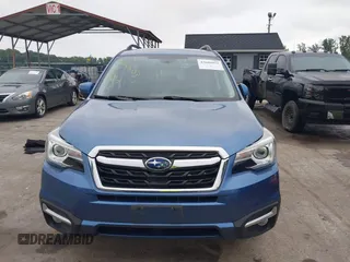 2018 Subaru Forester Touring with VIN JF2SJAWC6JH597365, listed as a IAAI auction lot 42606953 with 66,340 mi miles and . Bid and sale history available at DreamBid. Image 12.