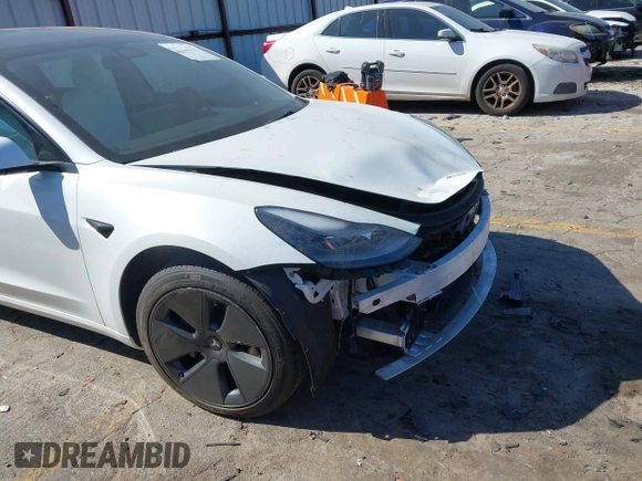 2022 Tesla Model 3 with VIN 5YJ3E1EA7NF103513, listed as a IAAI auction lot 41643592 with 35,631 mi miles and . Bid and sale history available at DreamBid. Image 19.