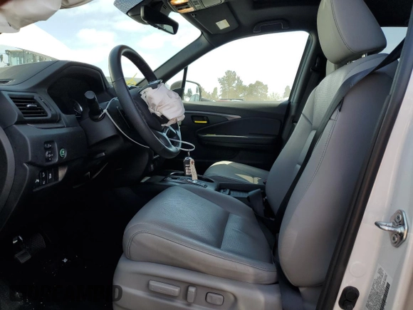 2023 Honda Passport EX-L with VIN 5FNYF8H58PB014241, listed as a Copart auction lot 55176105 with 16,672 mi miles and Salvage title. Bid and sale history available at DreamBid. Image 7.