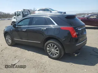 2018 Cadillac XT5 Luxury AWD with VIN 1GYKNDRS5JZ210221, listed as a Copart auction lot 52502595 with 68,579 mi miles and Salvage Title. Bid and sale history available at DreamBid. Image 2.