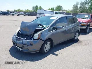 2013 Honda Fit with VIN JHMGE8H37DC023372, listed as a IAAI auction lot 40006280 with 117,791 mi miles. Bid and sale history available at carsss.com. Image 2.