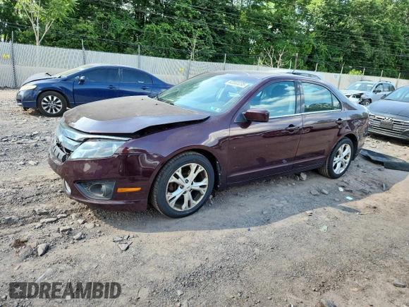2012 Ford Fusion SE z VIN 3FAHP0HA7CR387524, wystawiony jako Copart lot #62083235 z przebiegiem 104 698 mil mil oraz Szkoda całkowita • Salvage title. Historia ofert i sprzedaży dostępna na DreamBid. Obrazek 1.