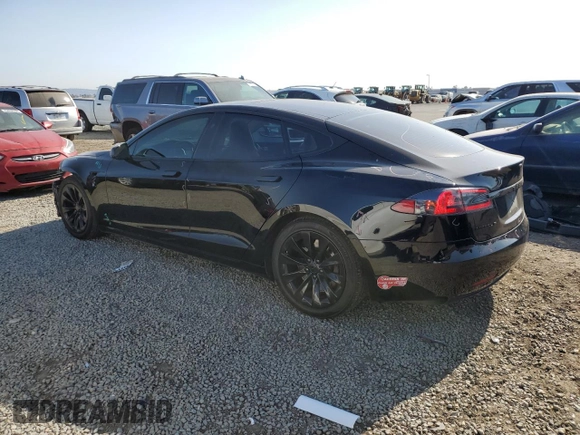 2016 Tesla Model S 90D with VIN 5YJSA1E20GF169954, listed as a Copart auction lot 61974475 with 124,560 mi miles and Salvage title. Bid and sale history available at DreamBid. Image 2.